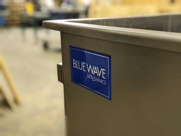 Bluewave ultrasonics sticker on industrial sink