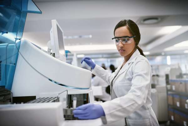 medical worker working with machine